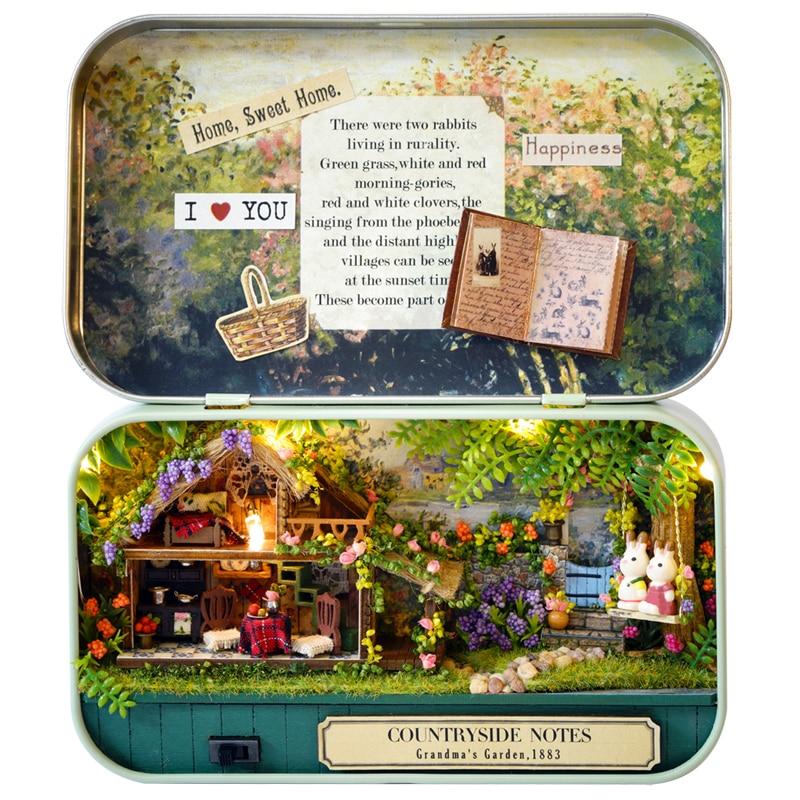 DIY miniature dollhouse tin box theatre countryside notes with LED lights featuring countryside with cute bunnies on swings