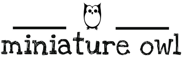 miniature owl store logo with owl sitting on top of logo name